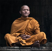Monk meditating in a traditional style